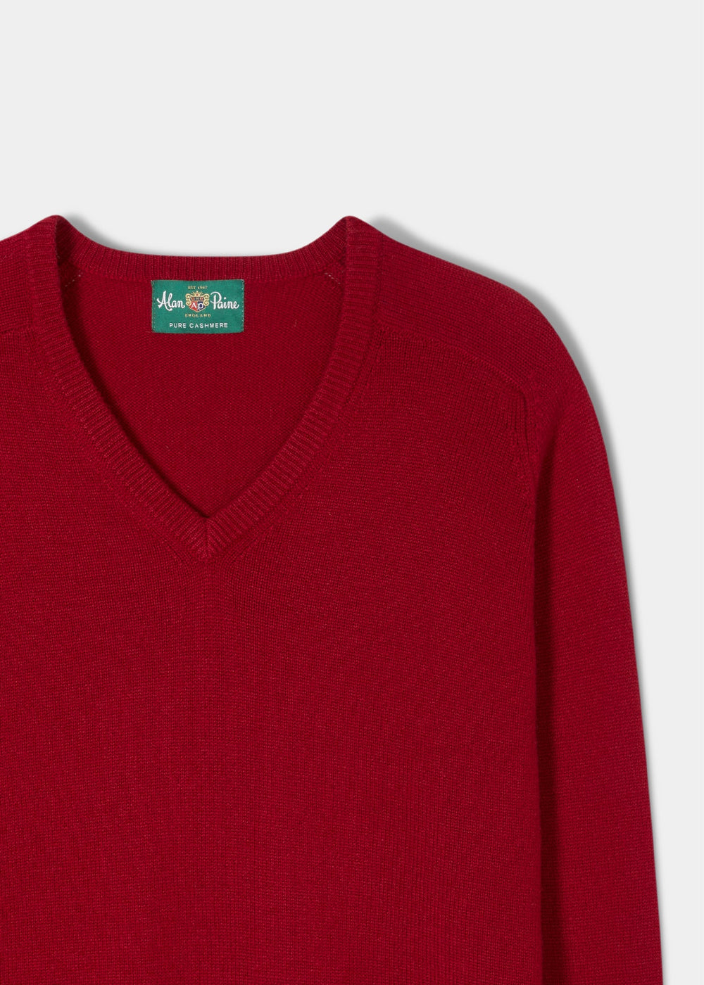 Selkirk Pure Cashmere V-Neck Jumper In Ruby, a luxury red cashmere V-neck sweater.