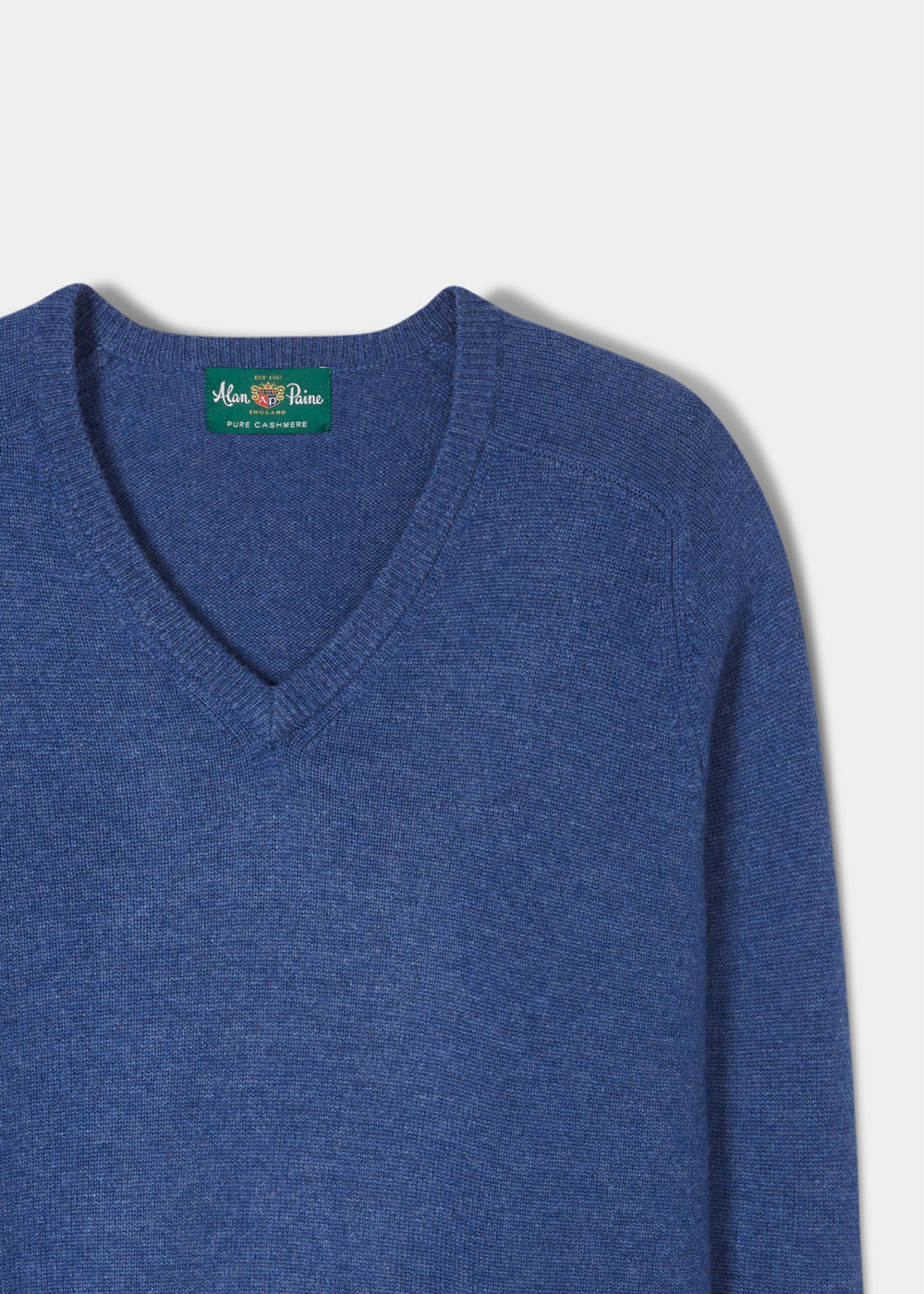 Selkirk Pure Cashmere V-Neck Jumper In Denim with a brand label at the inner neckline.