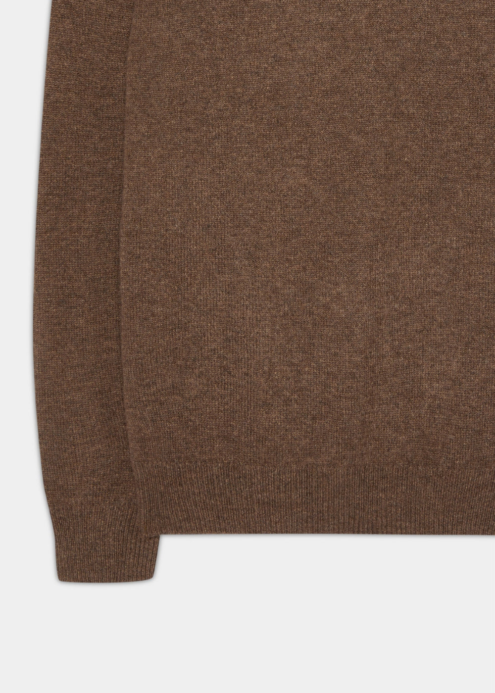 Close-up of the Lenzie Lambswool Crew Neck Jumper in Tobacco, highlighting side seam, ribbed hem, and cuff.