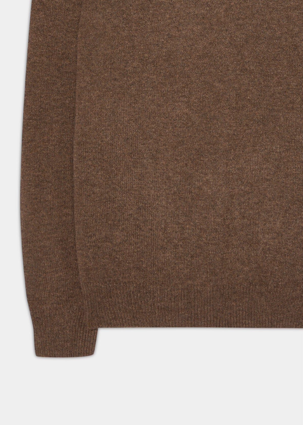 Close-up of the Lenzie Lambswool Crew Neck Jumper in Tobacco, highlighting side seam, ribbed hem, and cuff.