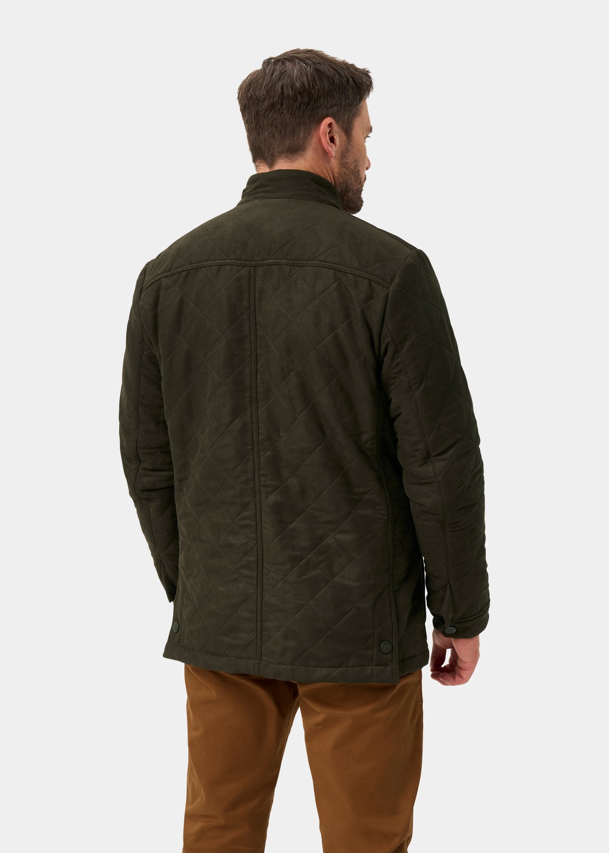 Man in Felwell Men’s Olive Quilted Jacket, regular fit, and brown pants, back view on plain background.