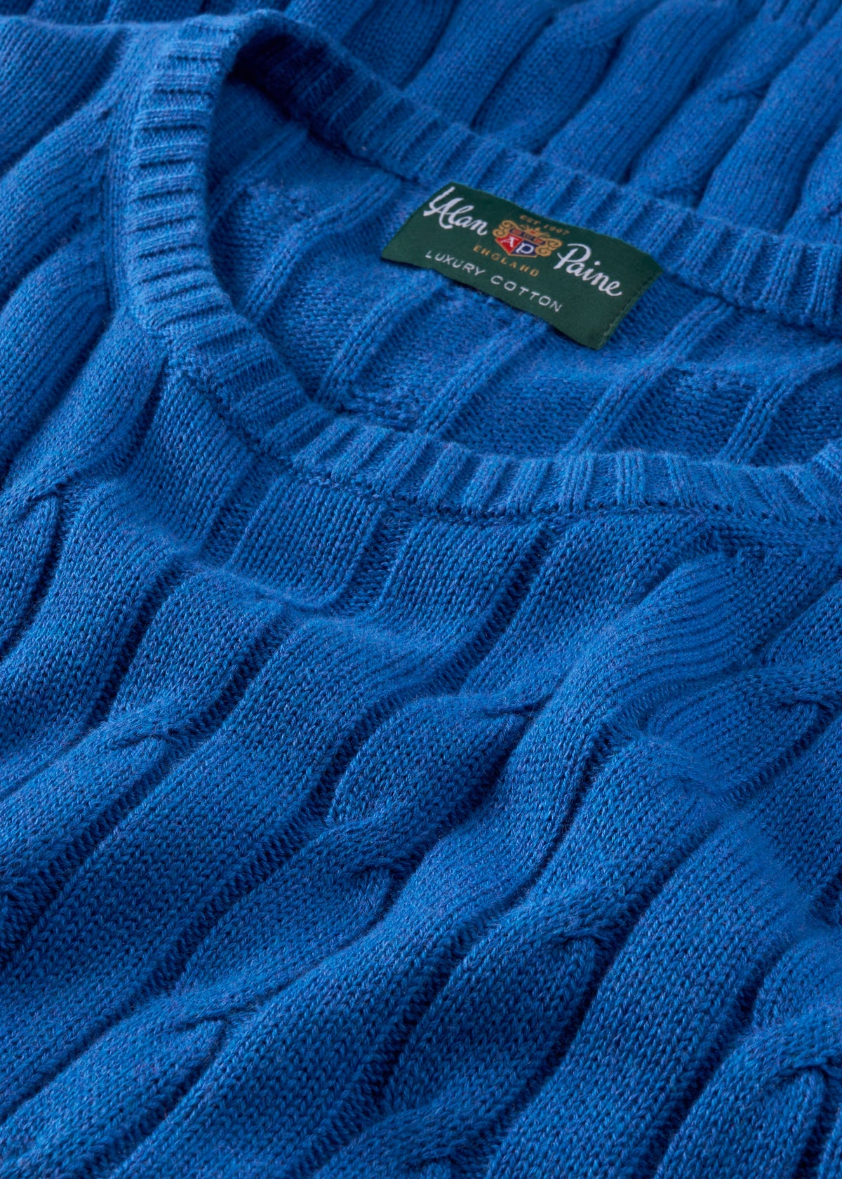 Close-up of Honley Cotton Cashmere Cable Knit Crew Neck Jumper in Regatta, regular fit—ideal for classic summer style.