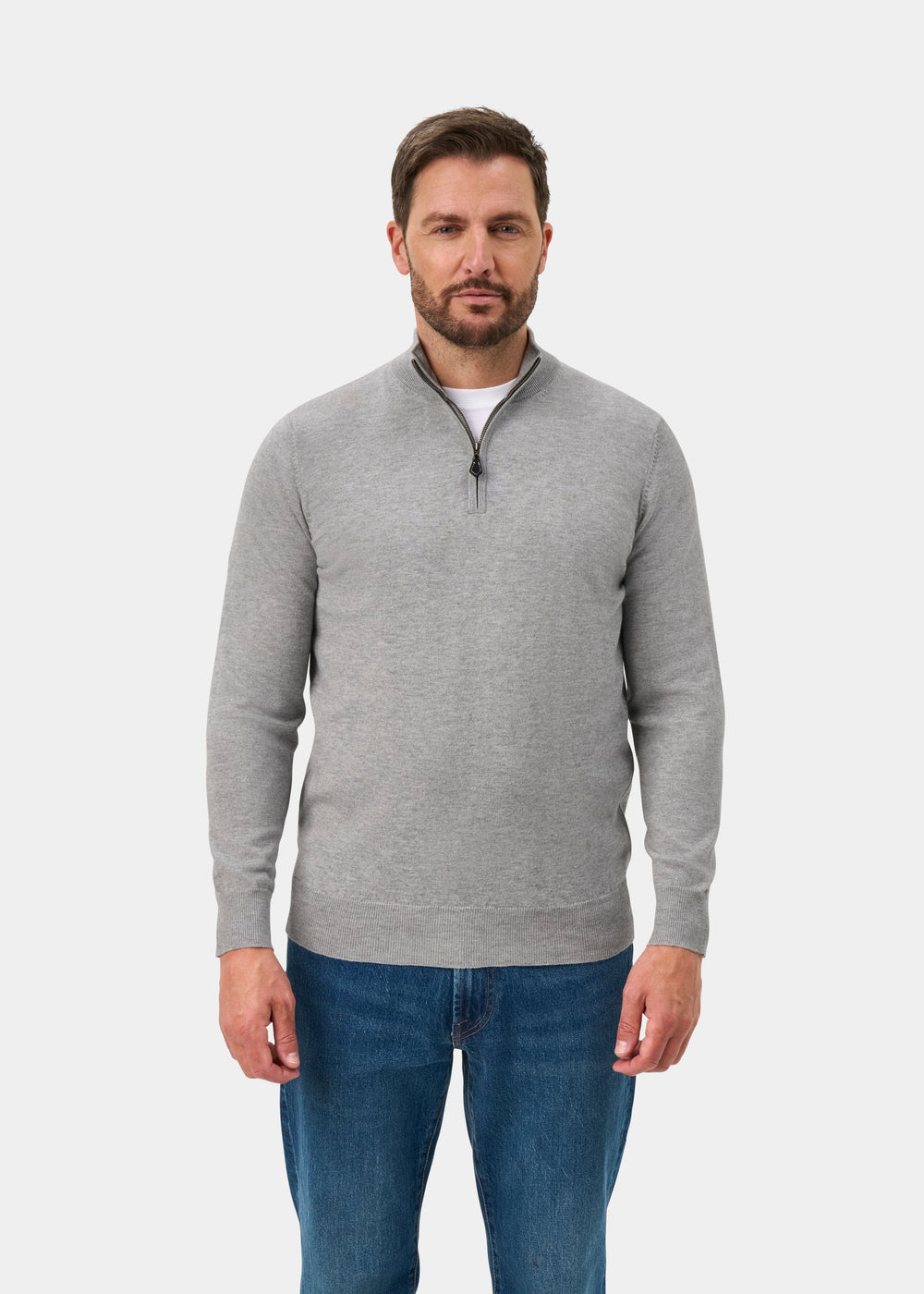 Man wears Ashfield Cotton Merino Quarter Zip Jumper in Light Grey Mix, regular fit, with blue jeans on white background.