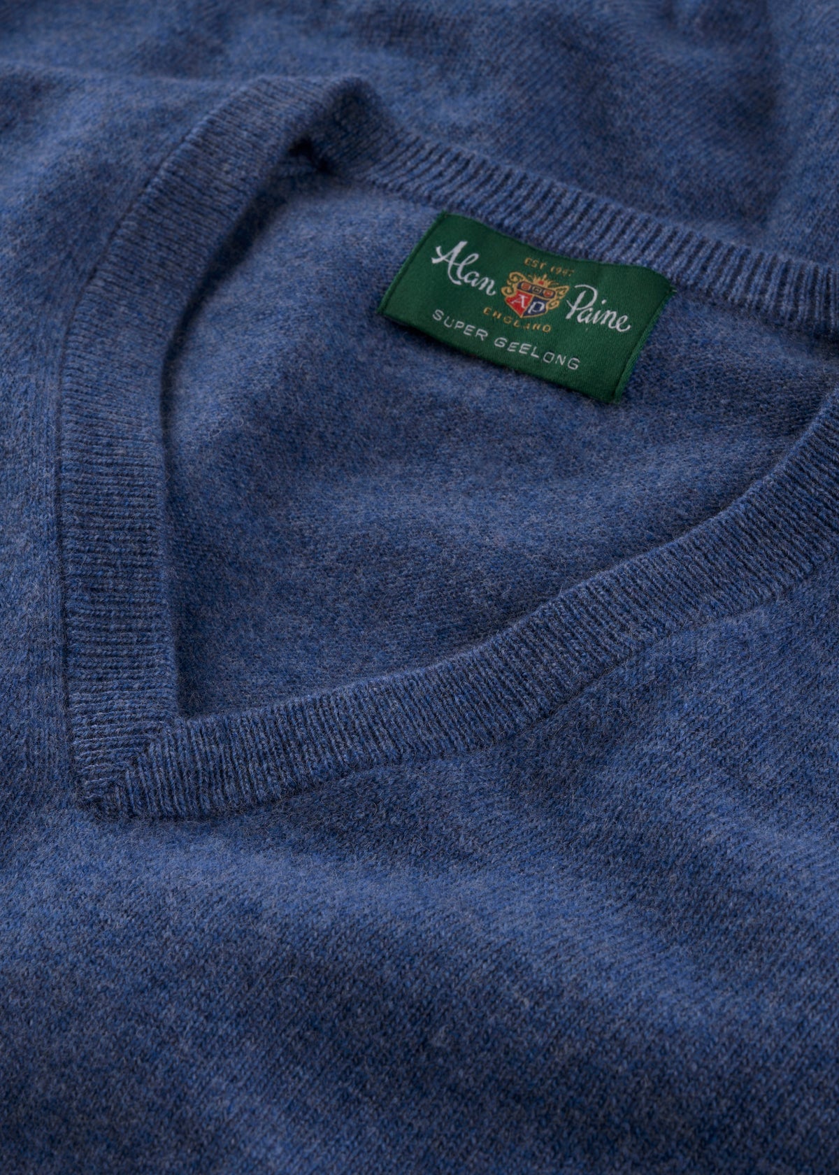 Albury Geelong Wool V-Neck Jumper in Ullswater, regular fit, with green Alan Paine label and Super Geelong tag.