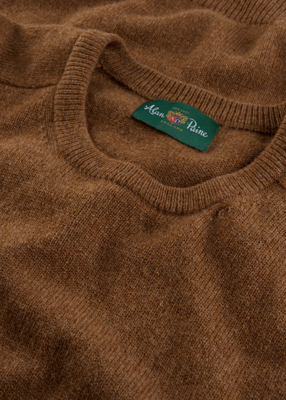 Dorset Lambswool Crew Neck Jumper in Driftwood—classic fit with saddle shoulder and green Alan Paine England label.