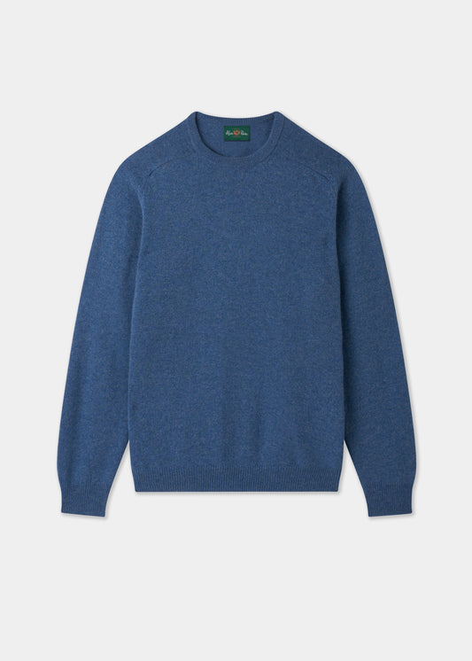 The Lenzie Lambswool Crew Neck Jumper in Jeans, regular fit, is displayed on a plain grey background.