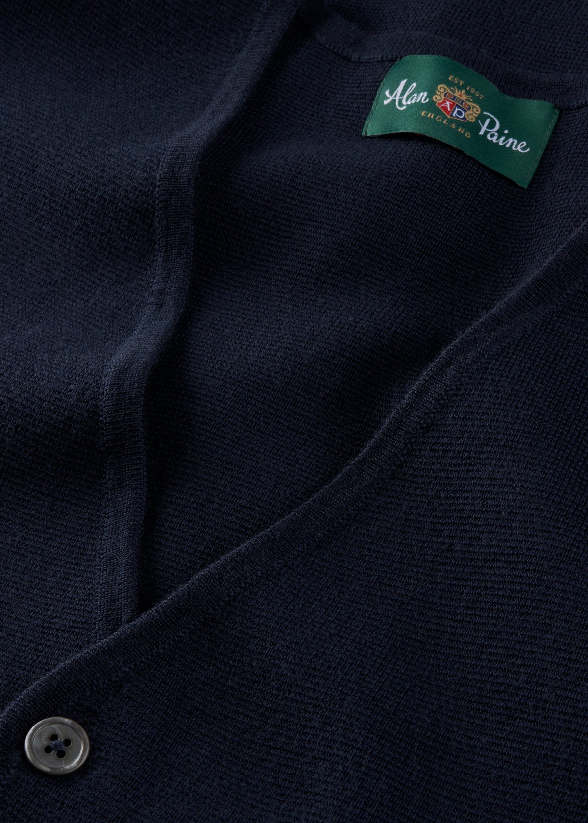 Thornley Merino Wool Tailored Dark Navy Waistcoat with a green neckline label and a single button.