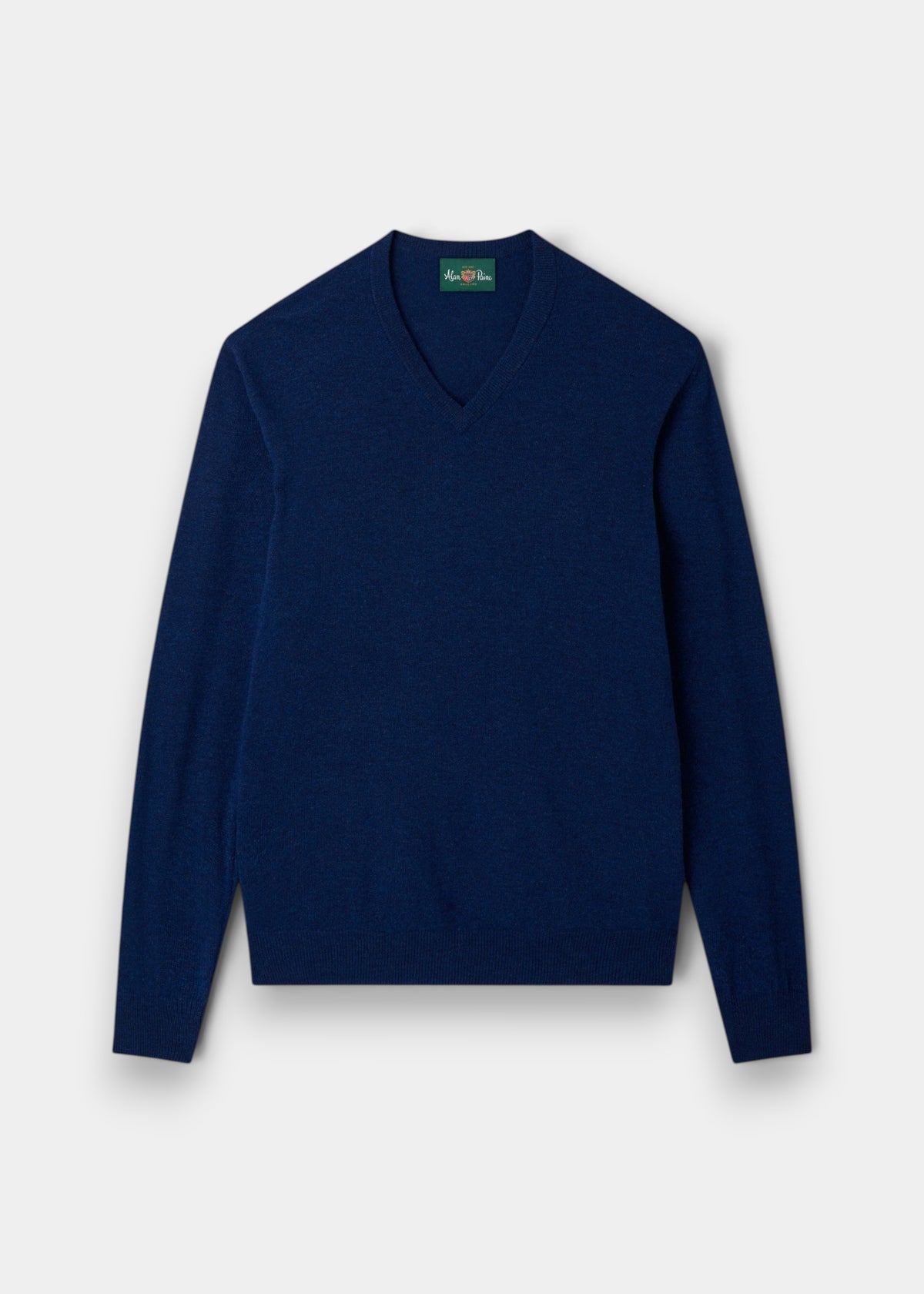 The Albury Geelong Wool V-Neck Jumper in Indigo (Regular Fit) is laid flat on a white background.