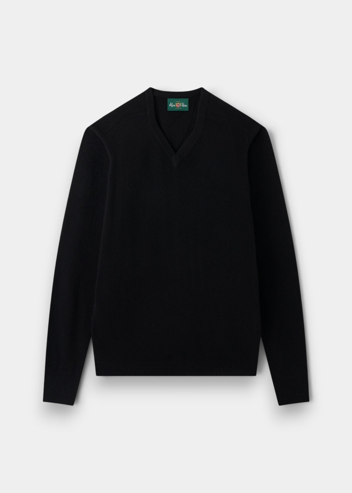 Alan Paine black V-neck jumper in soft lambswool with a classic fit, saddle shoulders, and ribbed cuffs and hem.