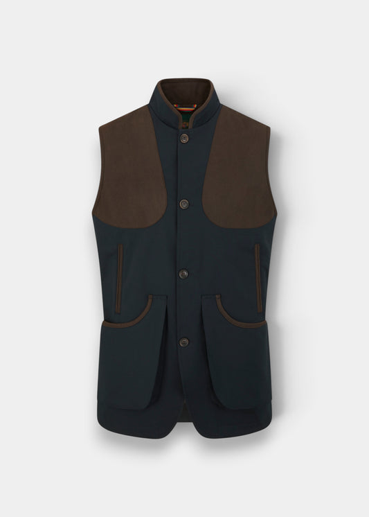 Alan Paine Dunswell men's dark navy water-repellent gilet with brown suede shoulder patches and gusseted pockets.