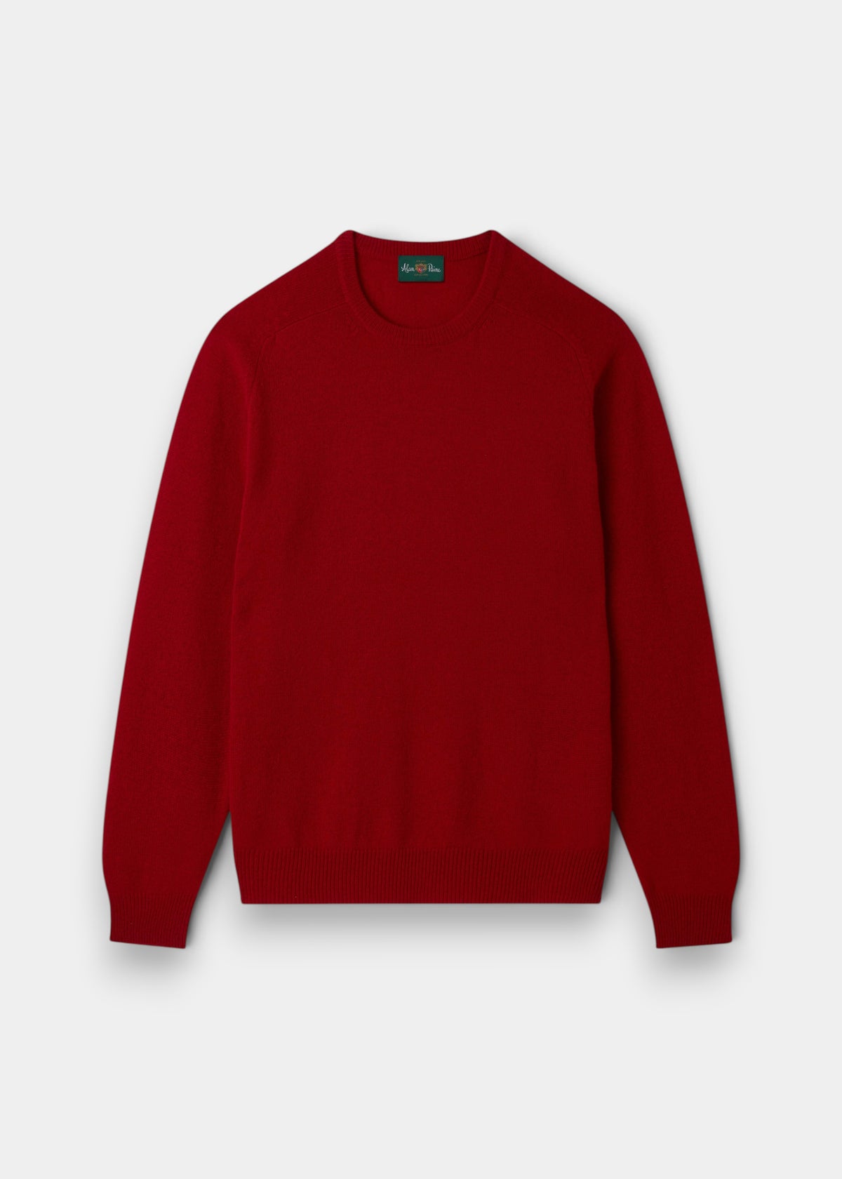 Lenzie Lambswool Crew Neck Jumper in Dubonnet, regular fit, long sleeves, on a light gray background.