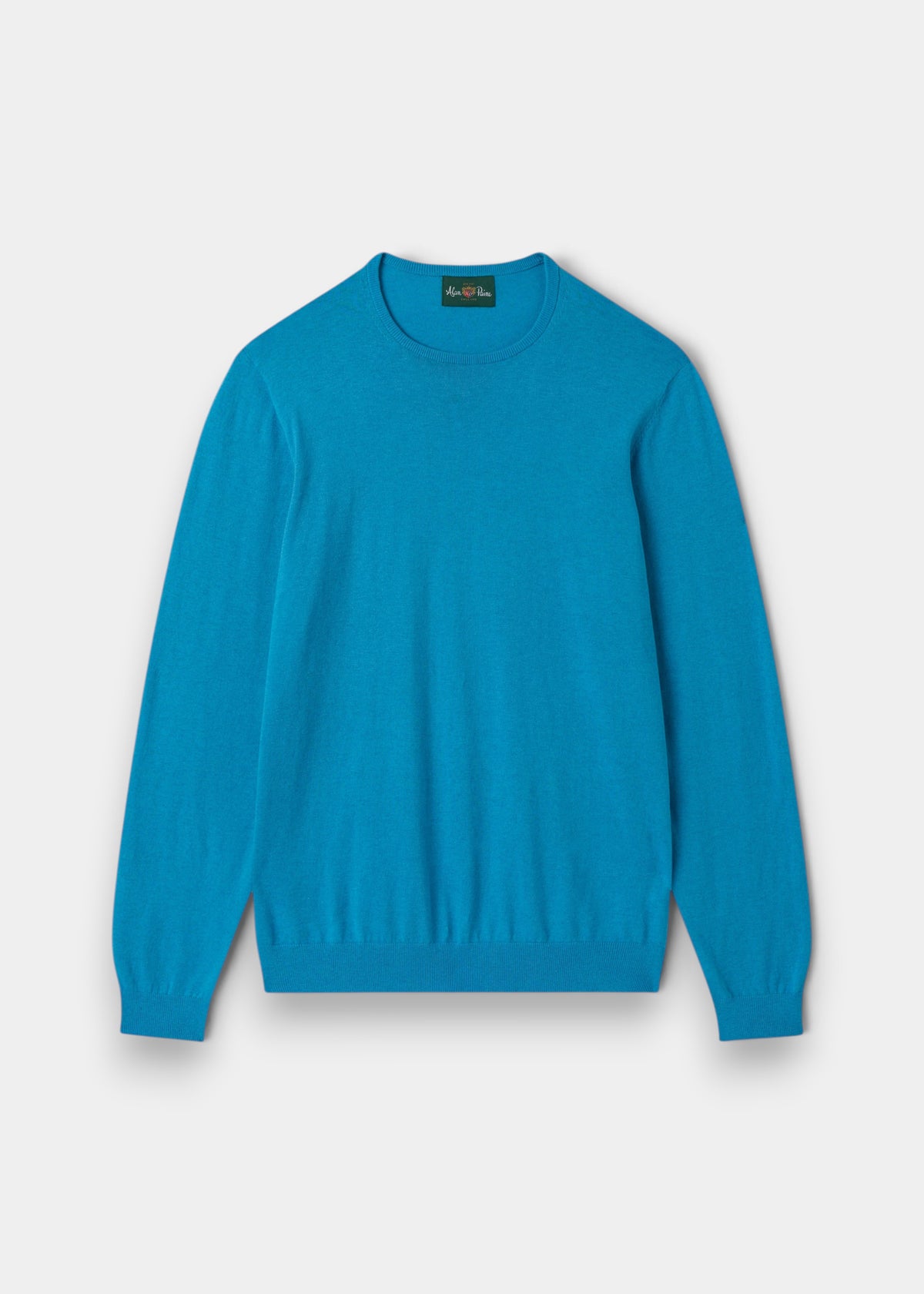 Alan Paine luxury crew neck jumper in Malibu blue, crafted from a soft blend of Pima cotton, silk, and cashmere.