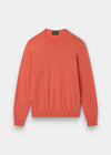 Alan Paine men's luxury crew neck jumper in melba orange, crafted from a soft pima cotton, silk, and cashmere blend.
