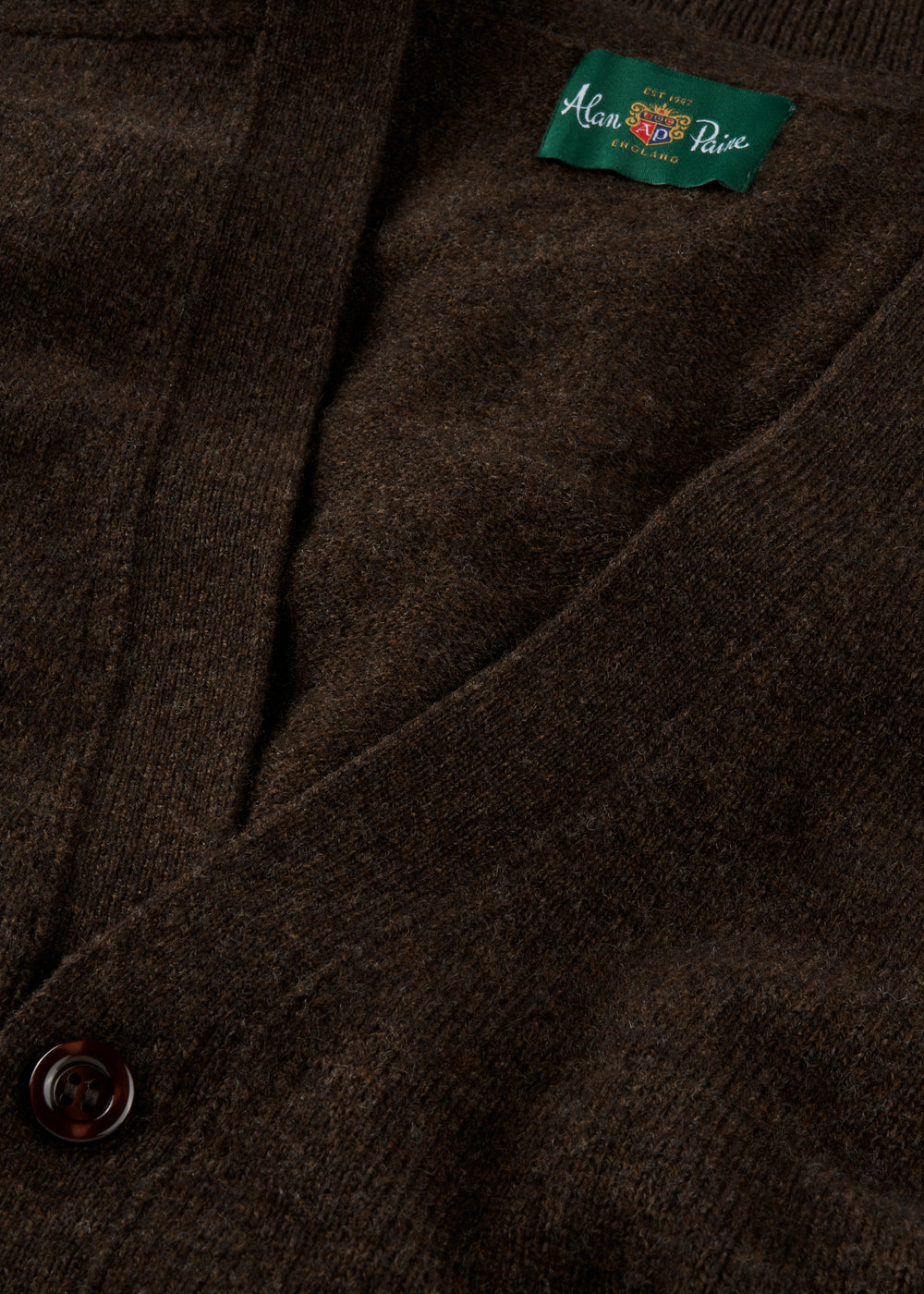 Close-up mens brown cardigan