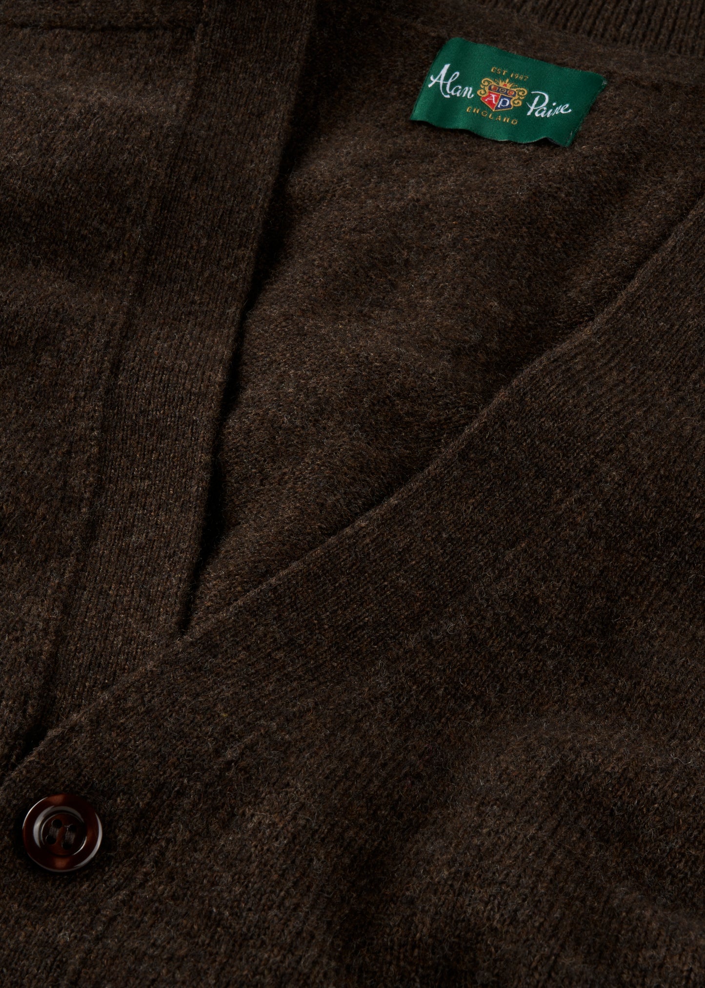Close-up mens brown cardigan