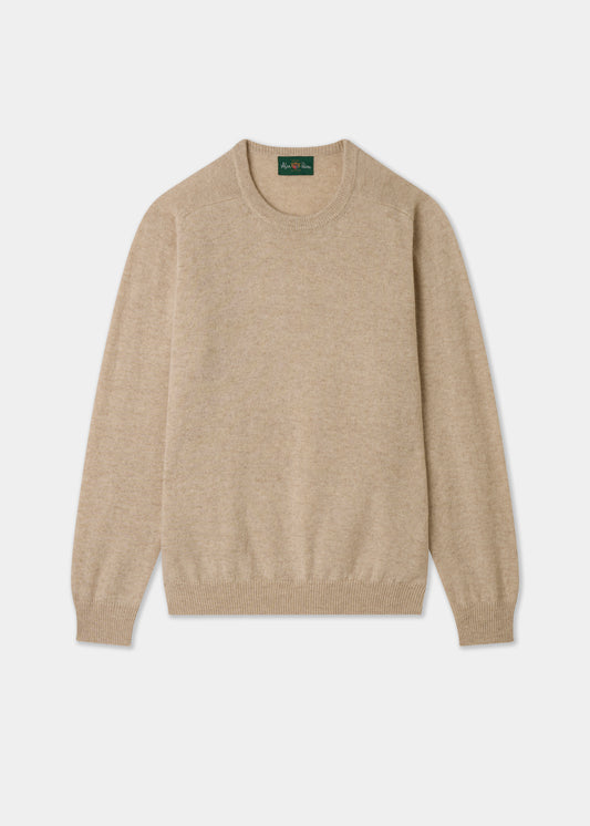 Beige sweater on a light gray background