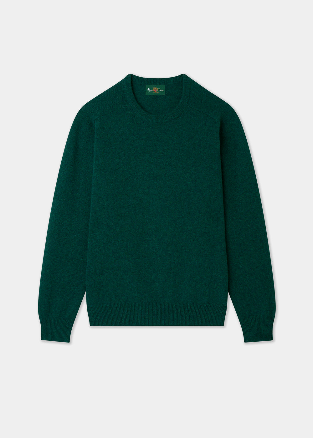 Green sweater on a light gray background