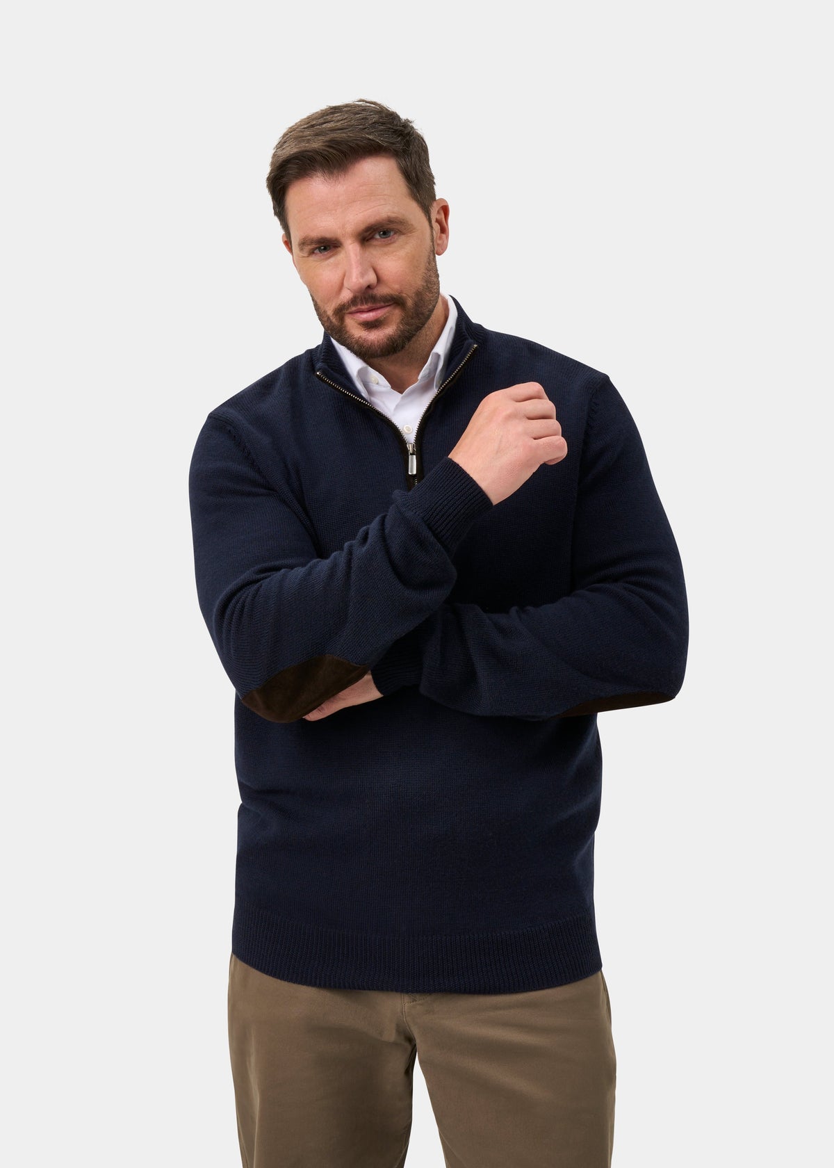 Man with brown hair wears the Kinmere Merino Wool Quarter Zip Jumper in Dark Navy against a plain light background.