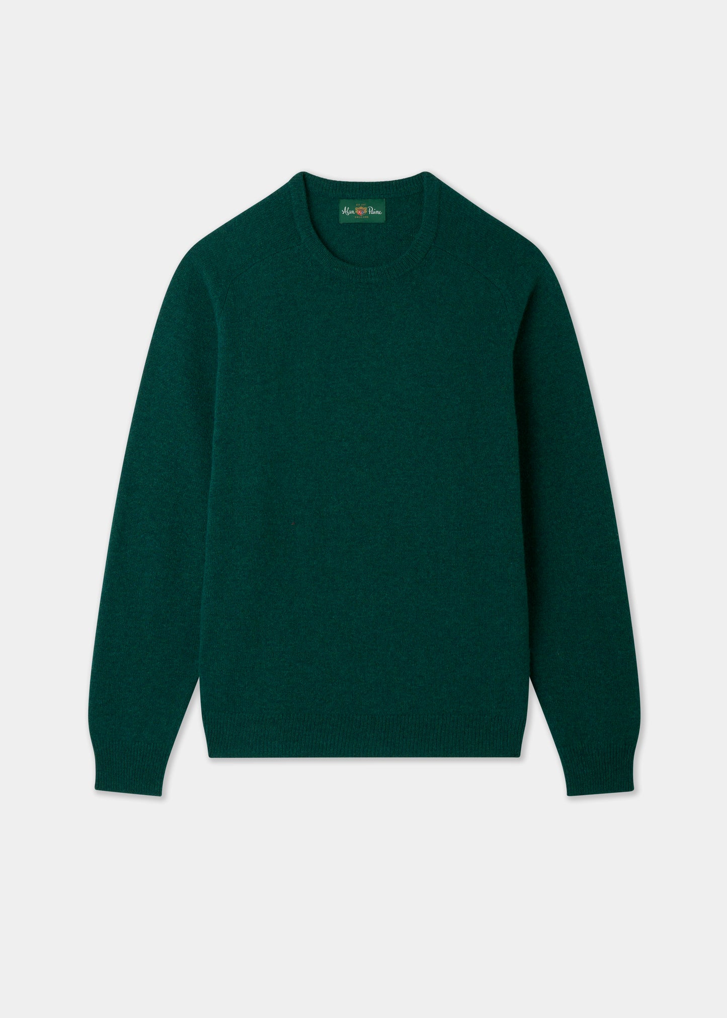 Green sweater on a light gray background