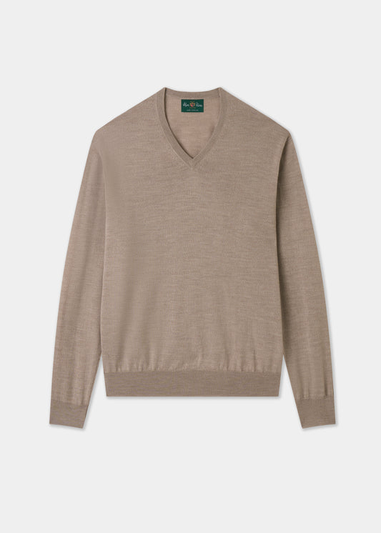 Beige sweater on a light gray background